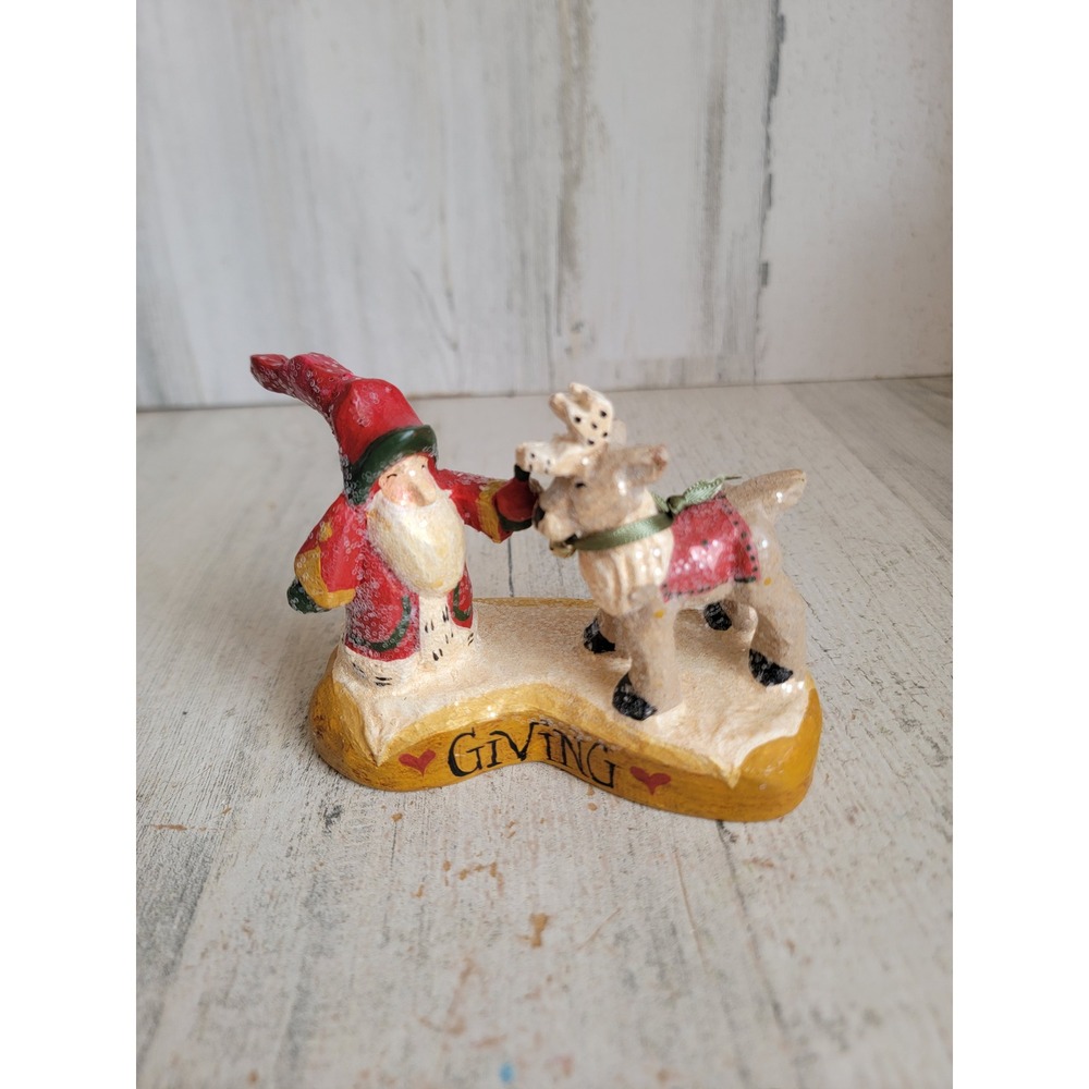 House of hatten giving Xmas Santa Claus reindeer figure glitter decor